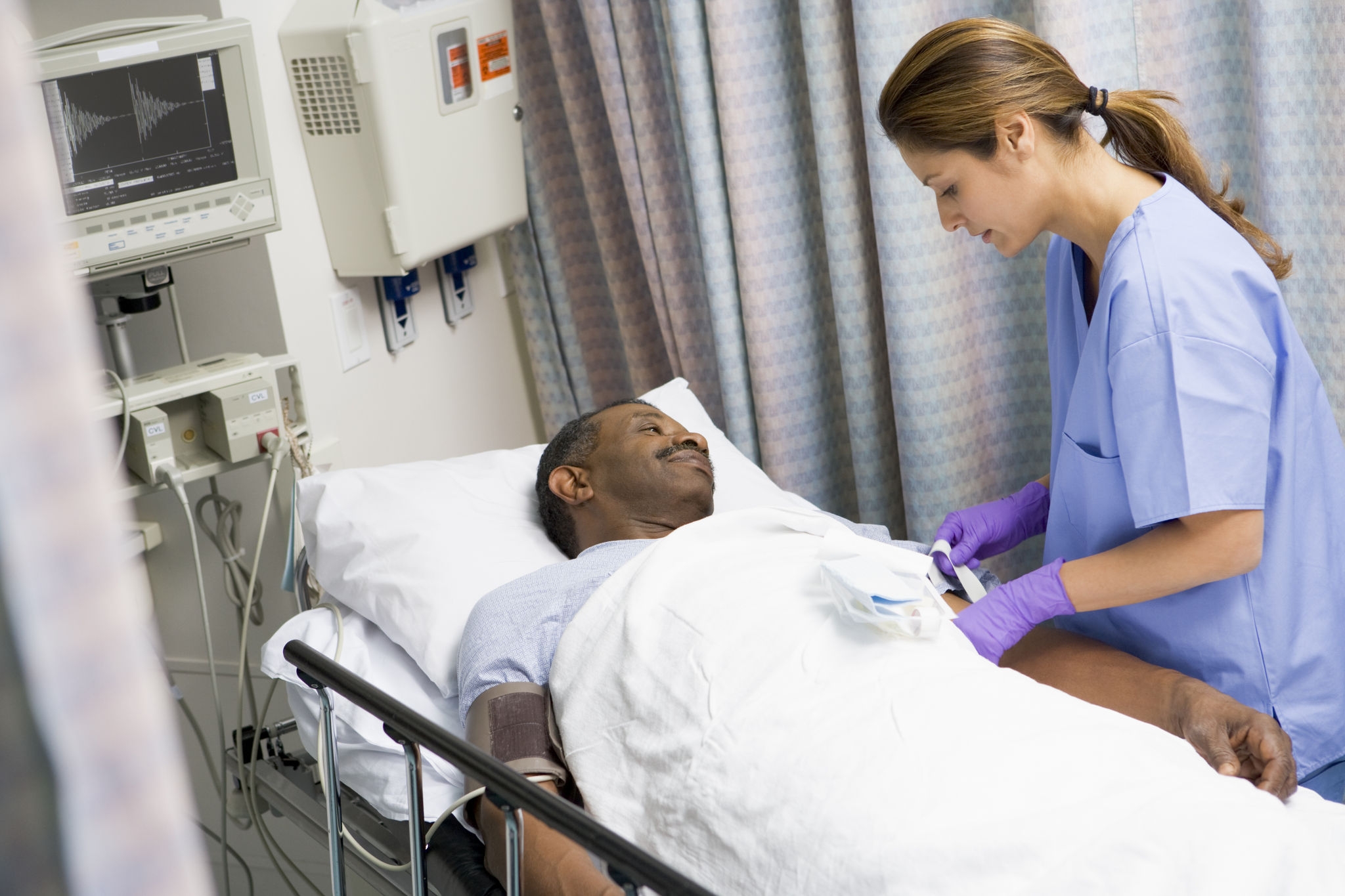 Nurse Caring For Patient