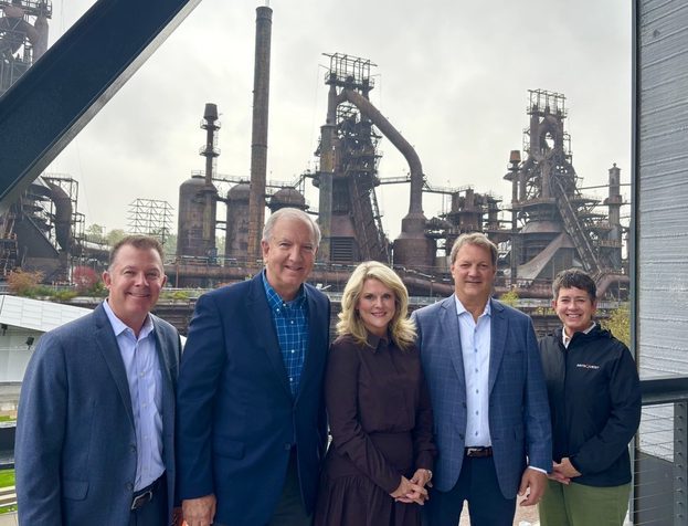 B. Braun and ArtsQuest representatives standing together at SteelStacks as part of a multi-year partnership supporting the ArtsQuest Creative Factory.