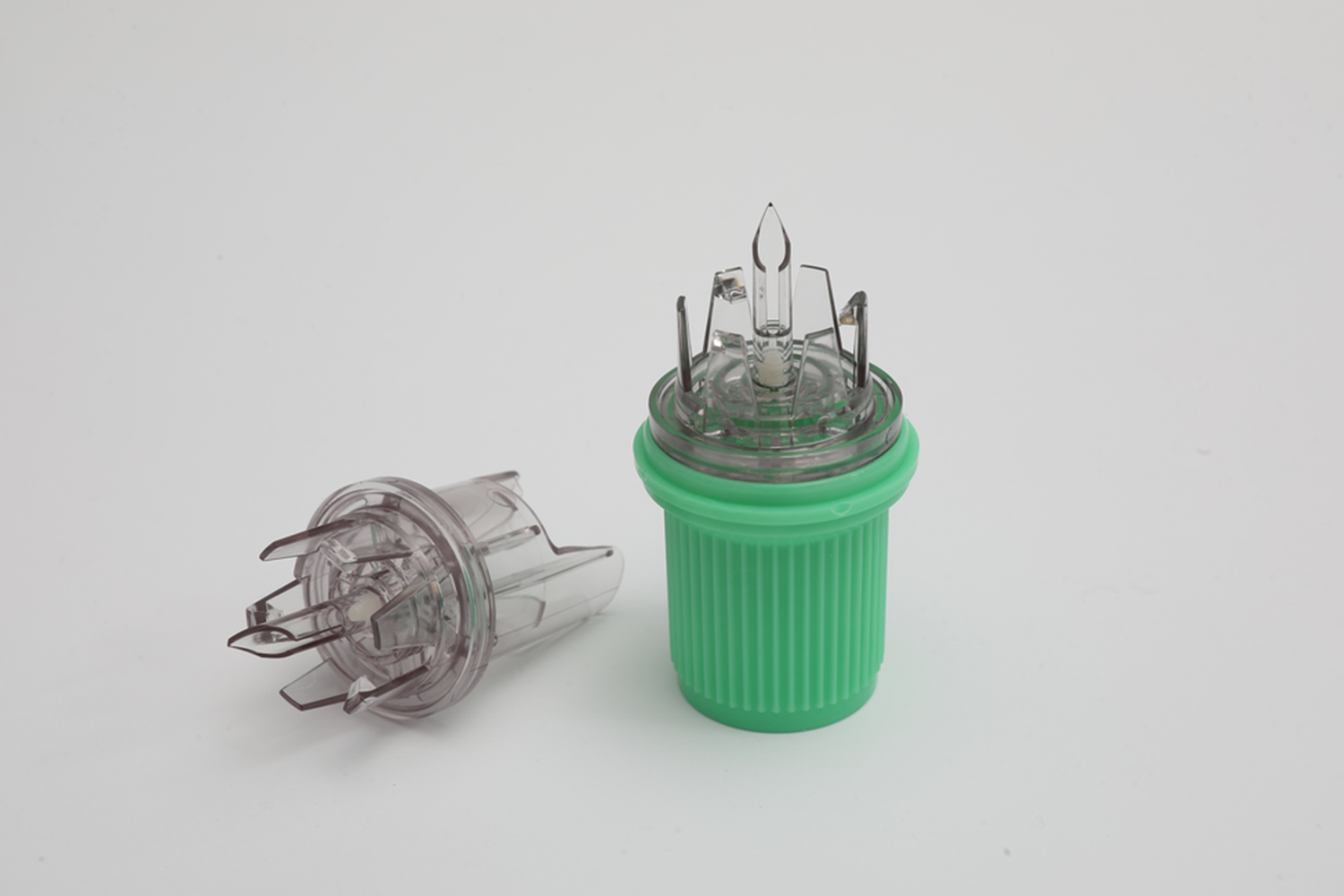 An addEase Binary Connector lying on its side, with a second one sitting up next to it. 