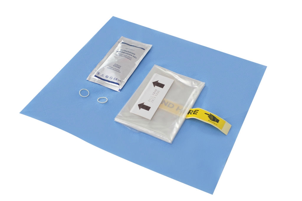 The EZCOVER Probe Cover Set lying on a blue drape. 