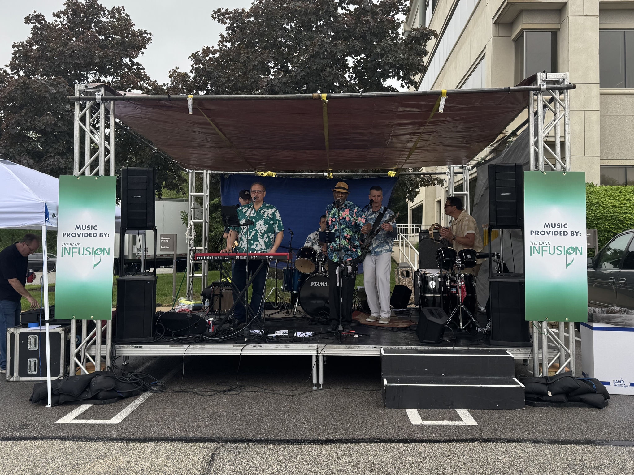 Members of B. Braun’s employee band, The Band InFusion, performing on stage at the 2025 Life Sciences PA Tailgate.
