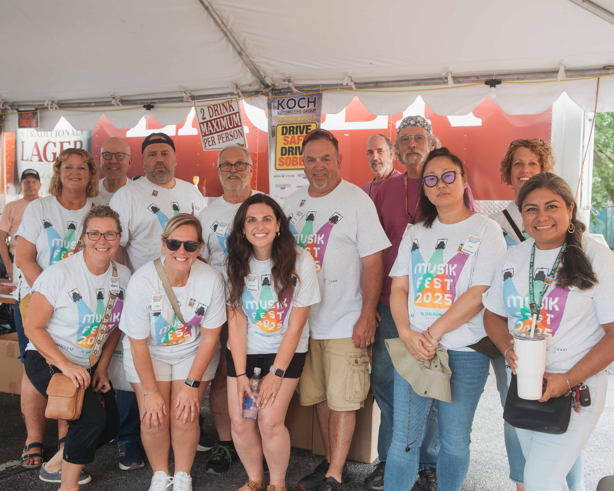 B. Braun employees volunteering together at Musikfest 2025 while staffing a festival food and beverage stand.