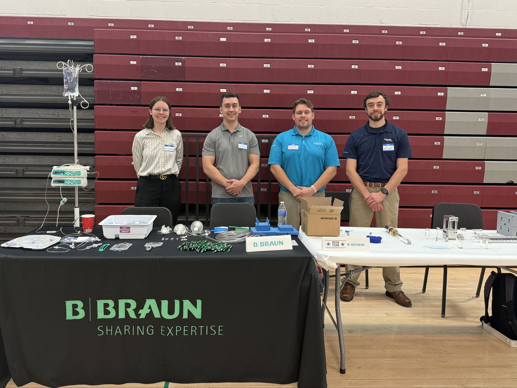 B. Braun team members at the Orefield Middle School STEAMM Expo with a STEM education display booth.