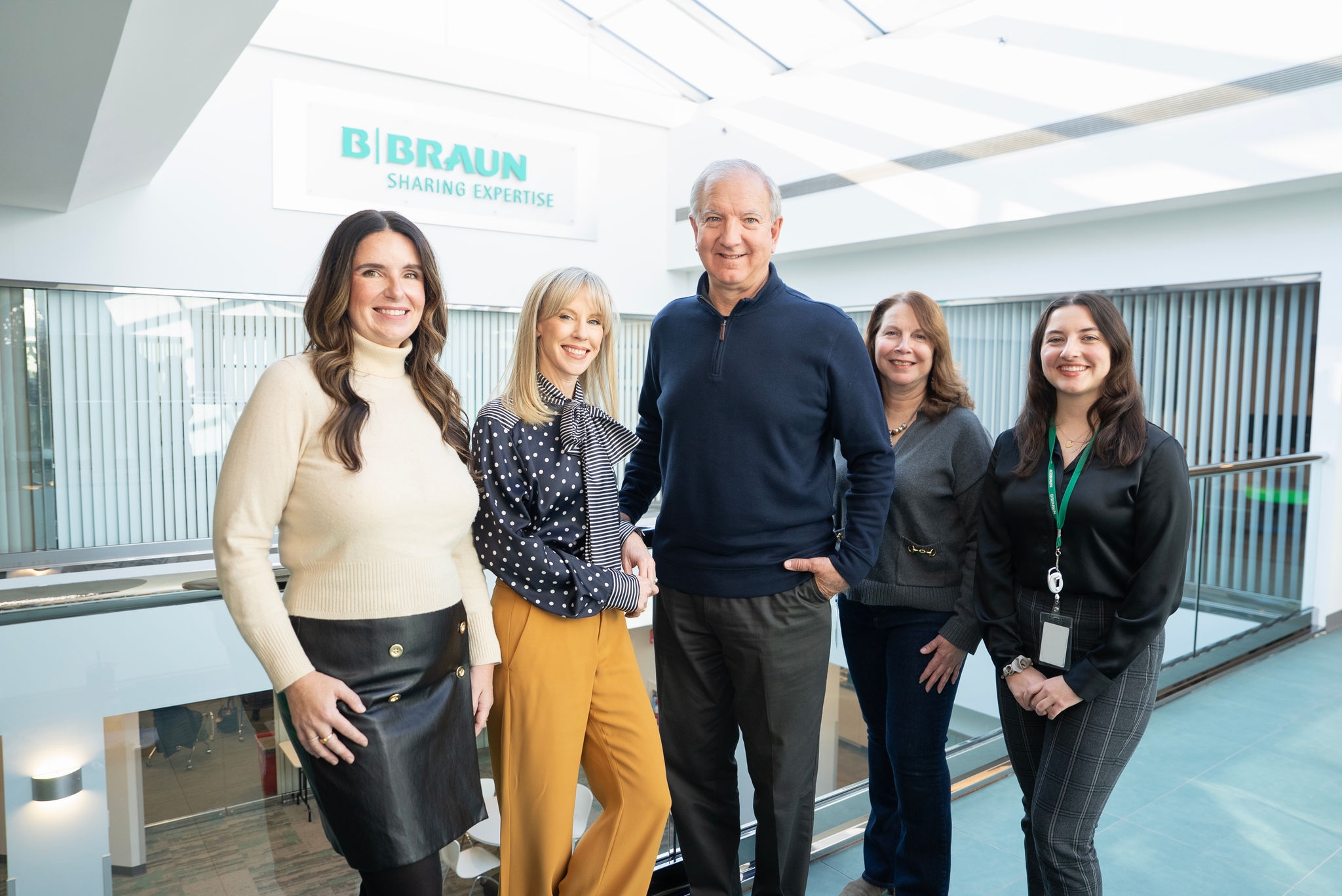 Members of the Infused Community Newsletter Editorial Team gathered in a B. Braun office location for a group photo.