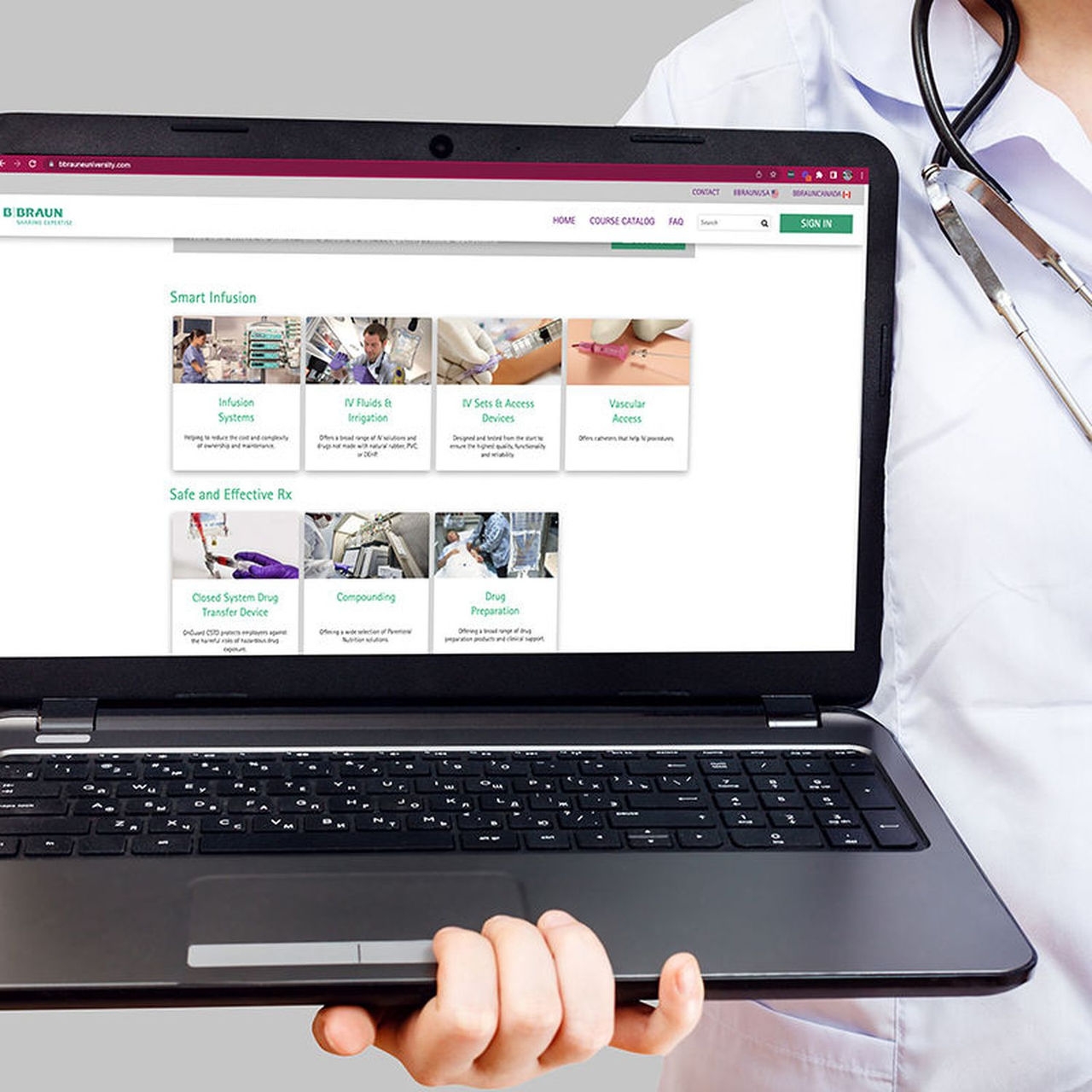 Laptop displaying B. Braun e-University being held by a provider that is slightly off screen. 