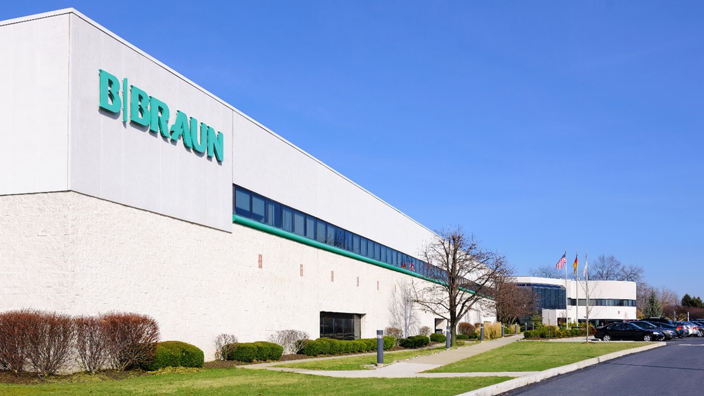 An exterior photo of the B. Braun Medical facility under a blue sky.
