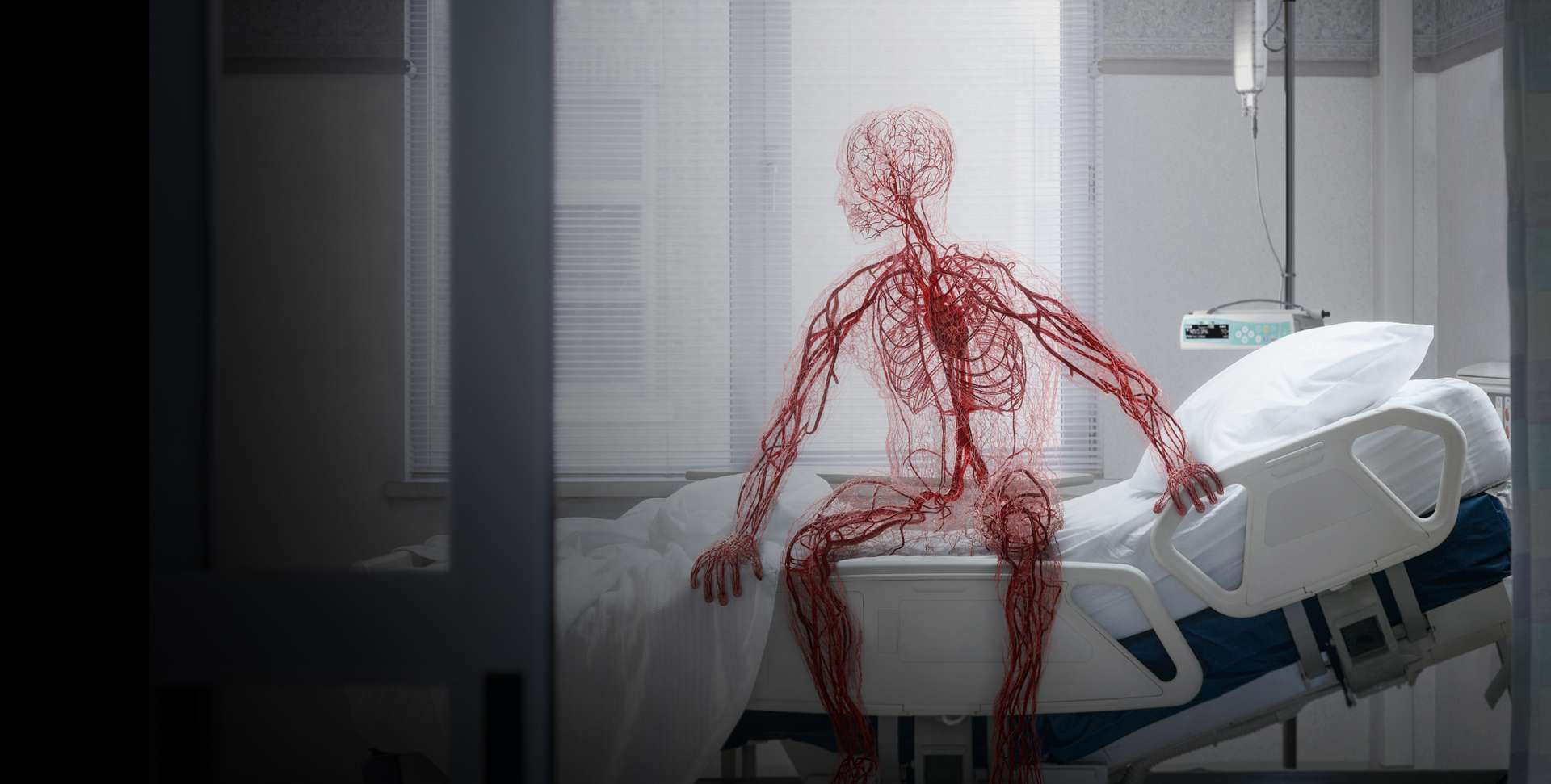 Veins create a shape that resembles a man who is sitting on a hospital bed. 